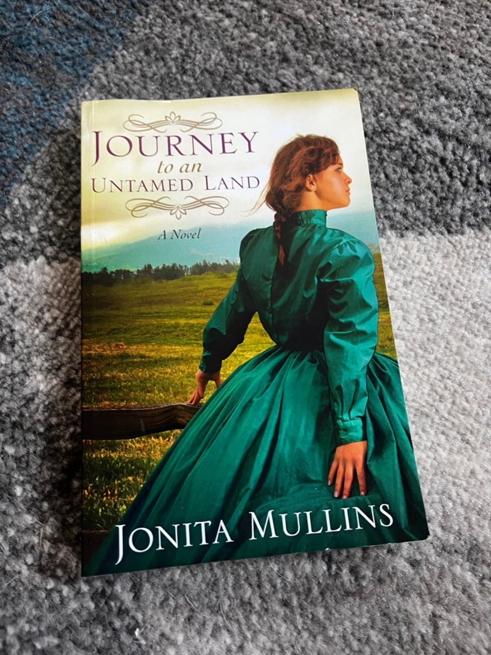 Journey to an Untamed Land by Jonita Mullins - Green Cover